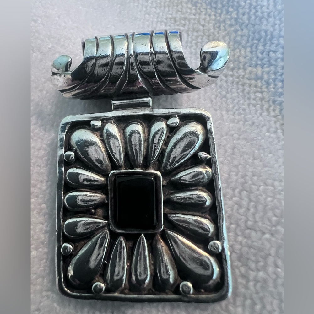Elegant Silver Pendant with Black Stone